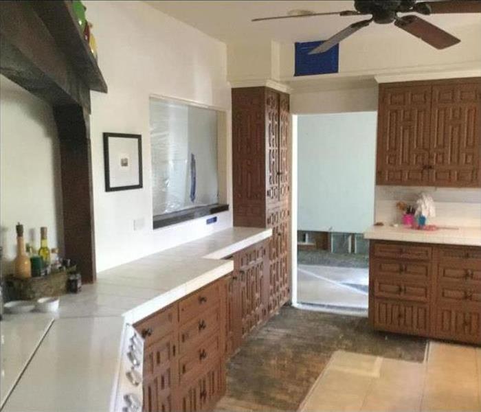 kitchen with damaged floors