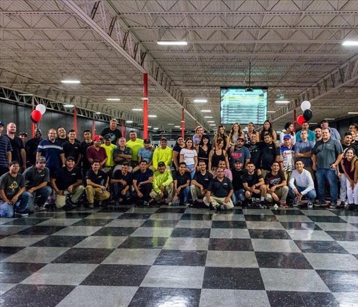team at indoor race track